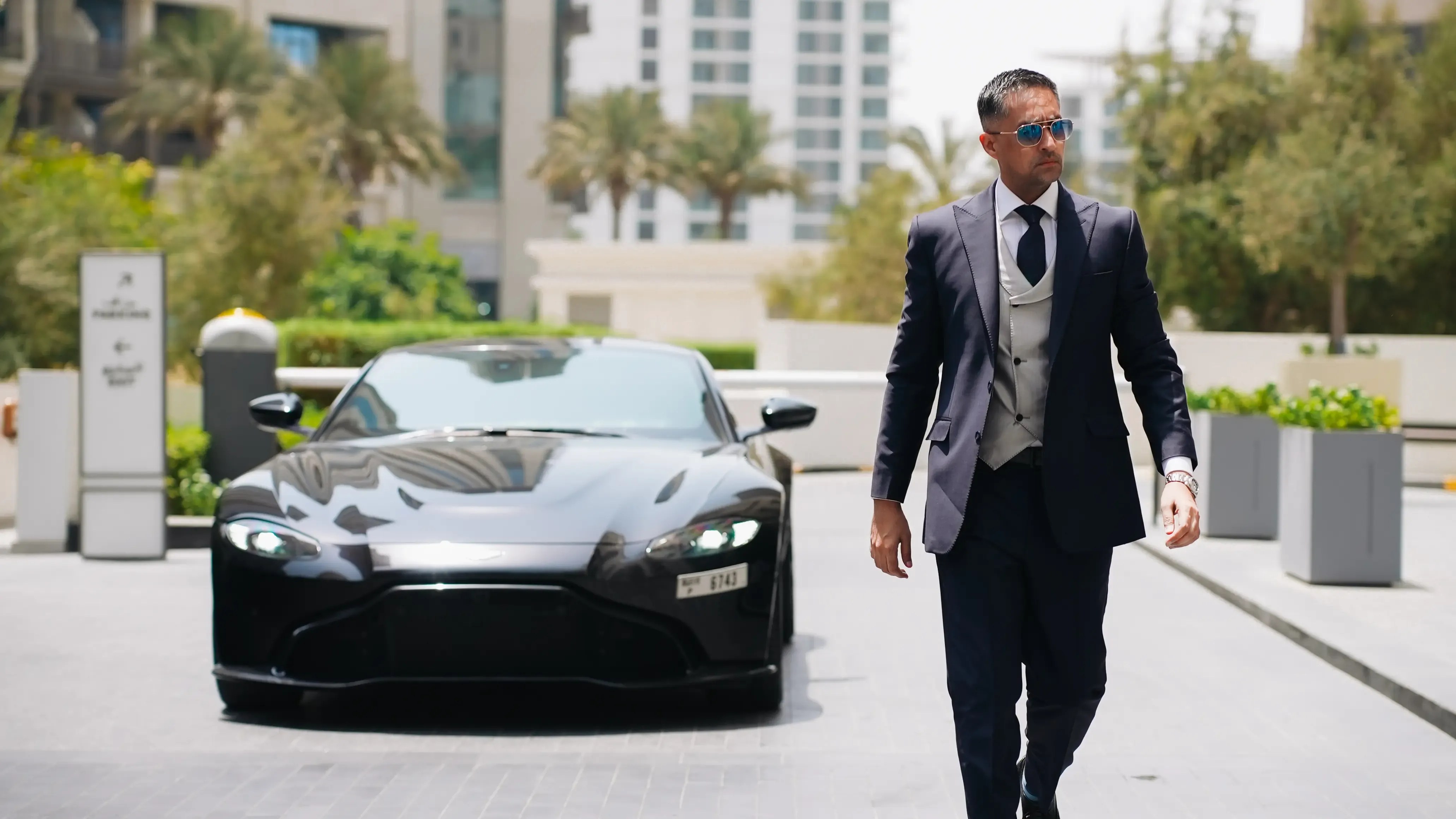 Real estate advisor consulting with clients in a modern Dubai office