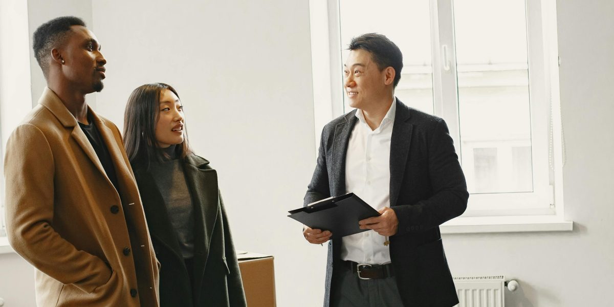 A real estate professional provides expert advice to a client, discussing property options.