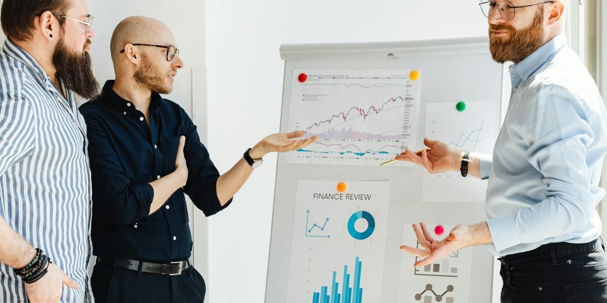 A team discussing growth strategies, illustrating the forward-looking approach of real estate developers in a dynamic market.