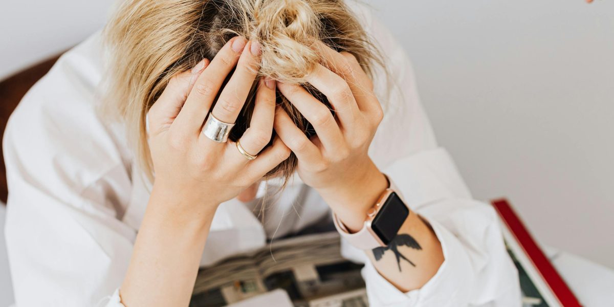 An individual contemplating a complex investment decision, reflecting the challenge of choosing the right partner.