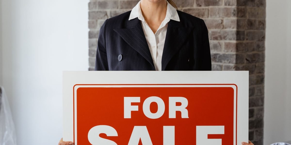 A person thoughtfully considering various investment options in a calm, professional setting.