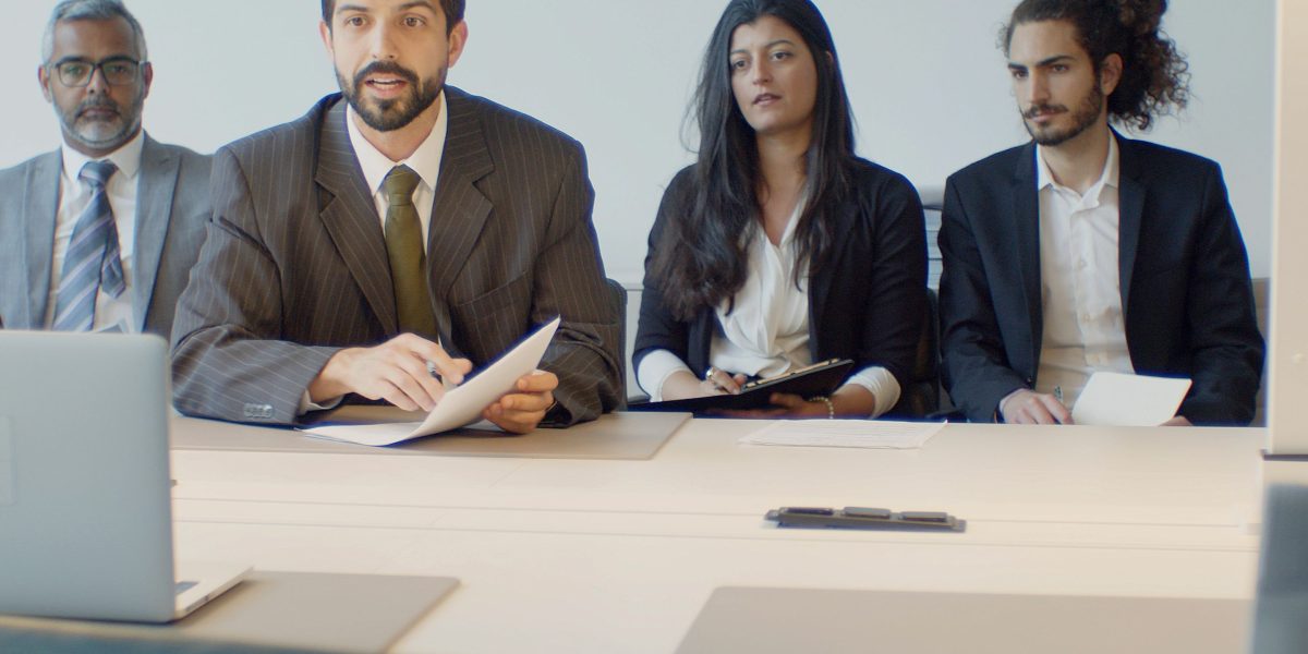 A business team conducting an interview, symbolizing the vendor diligence process for selecting a marketing agency.