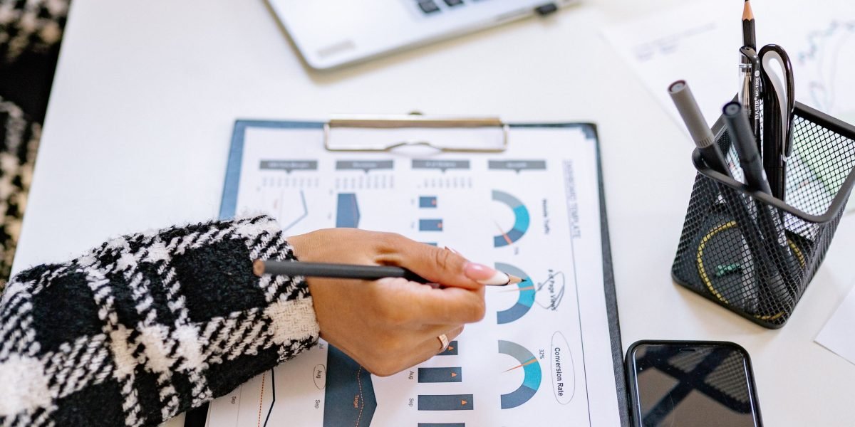 A person reviews a comprehensive guide on real estate investment opportunities in Dubai.