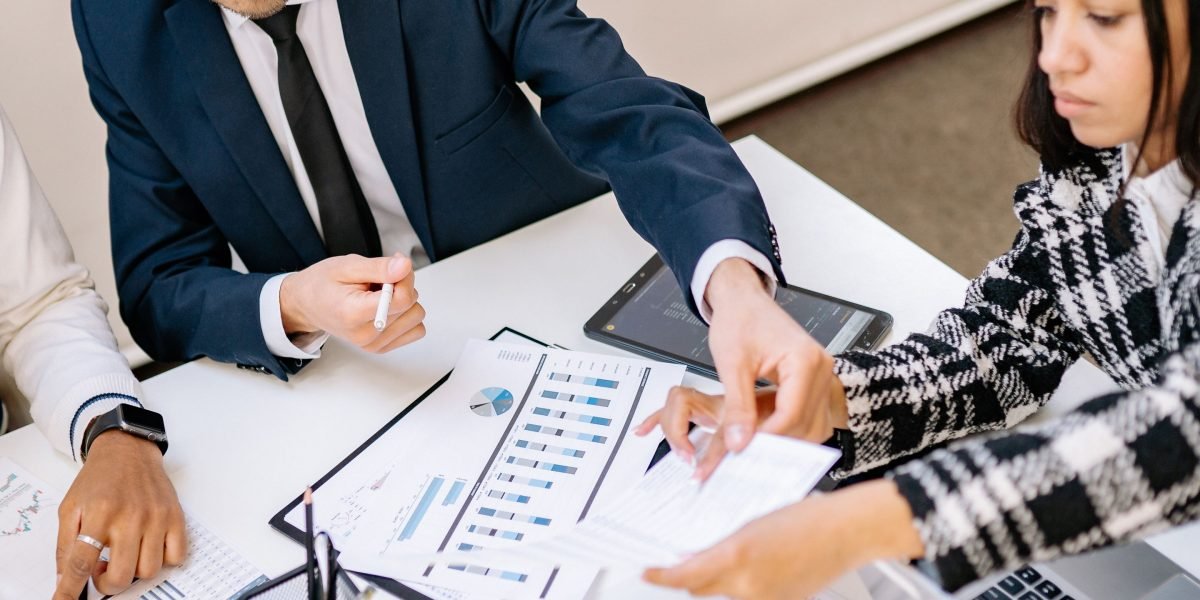 Professionals collaborate to devise a data-backed real estate marketing strategy.
