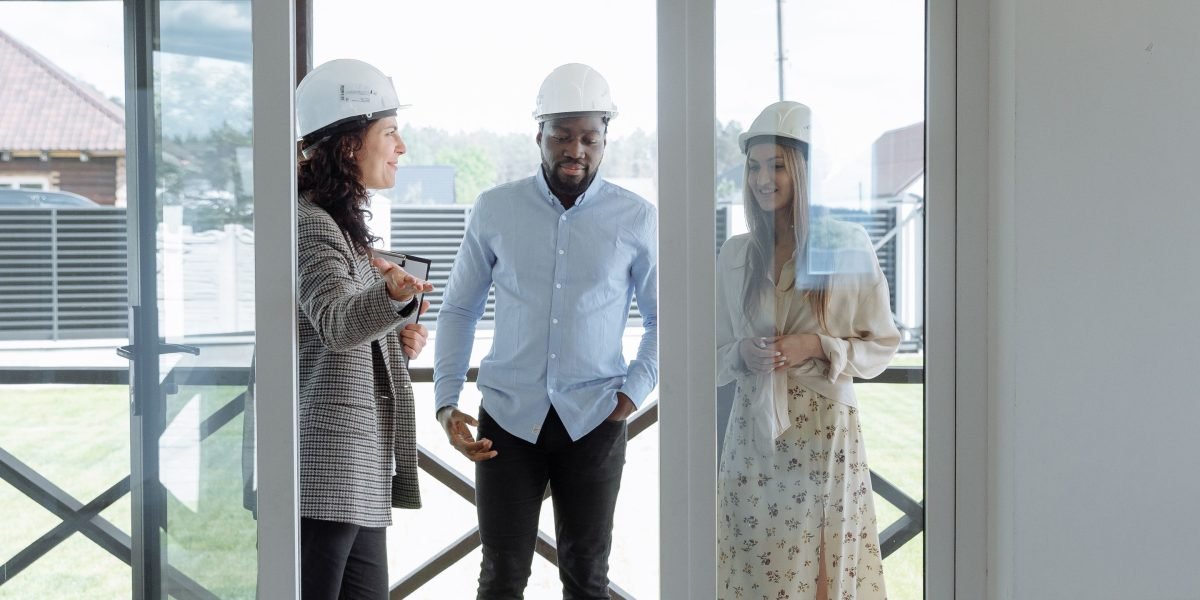 A property owner discusses rental income and cash flow strategies with an advisor.