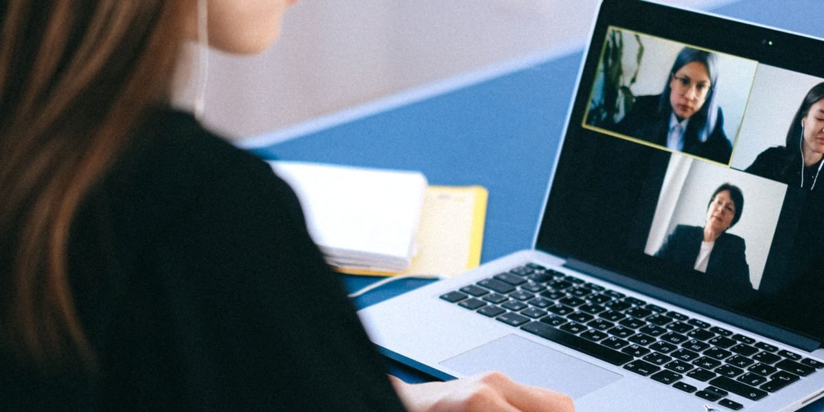 A real estate agent effectively building connections and trust with a diverse client base through digital platforms.