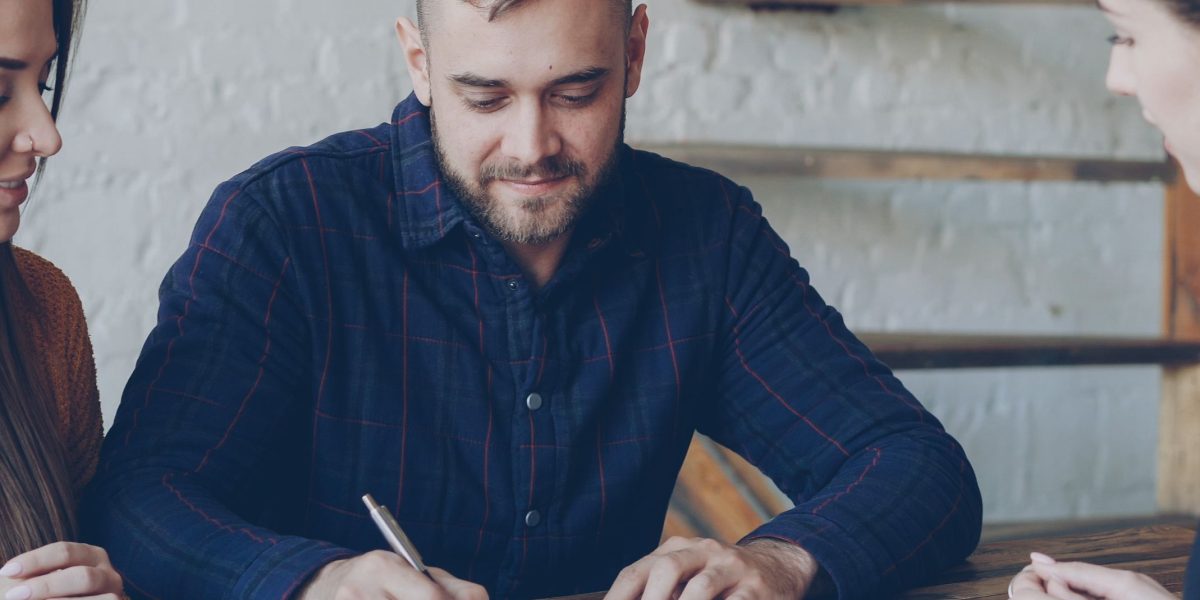 A person seeking advice from a professional, symbolizing the guidance a real estate consultant provides in Dubai's market.
