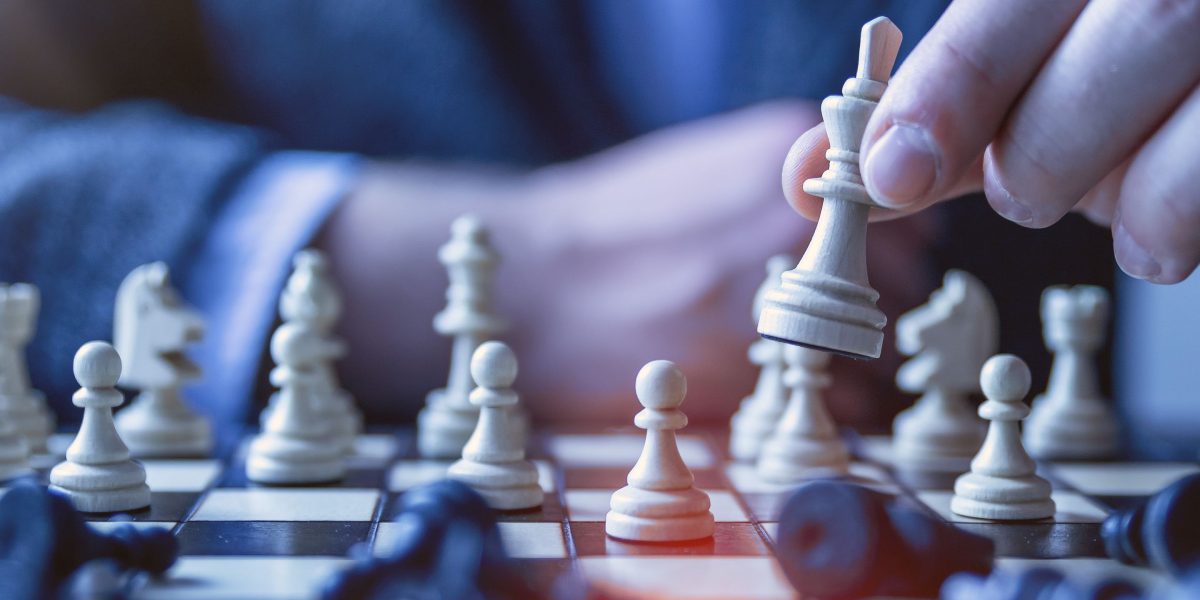 A person thoughtfully considering options, symbolizing the strategic decision-making process between independent consultants and full-service brokerages.