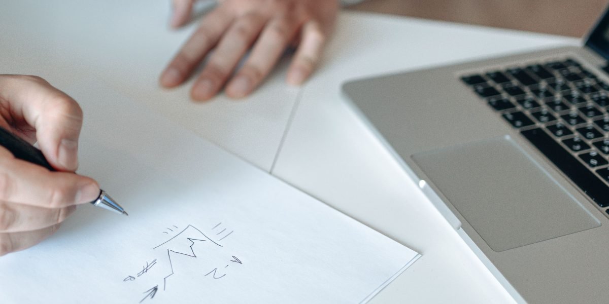 An investor carefully weighing the pros and cons of different property types in Dubai.