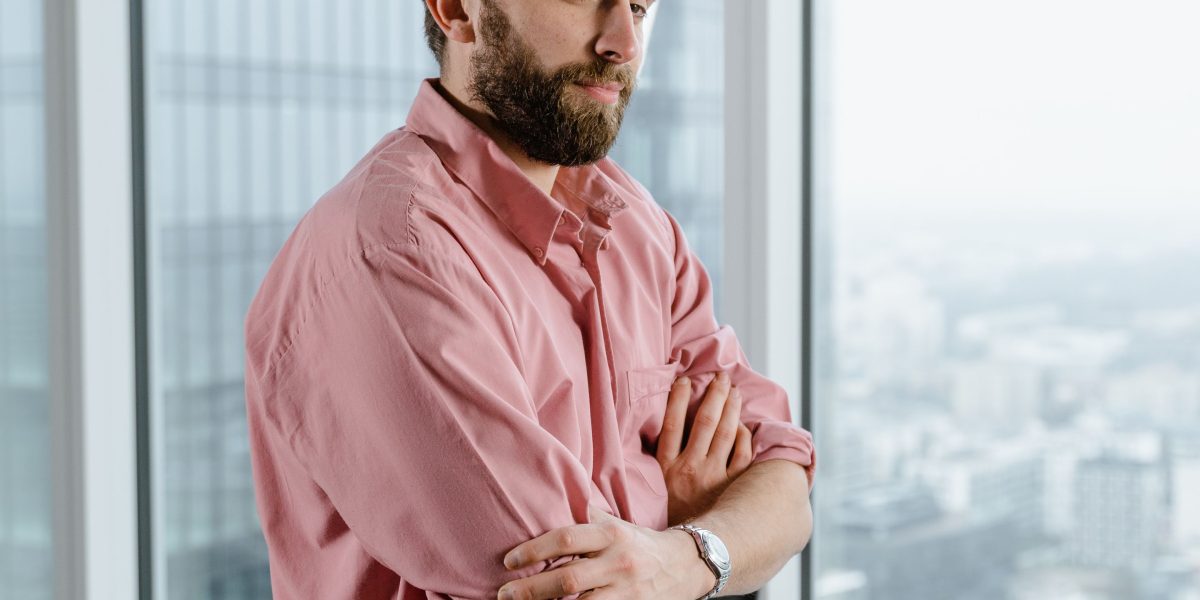 An individual looks confidently towards the impressive Dubai skyline, symbolizing career aspirations.